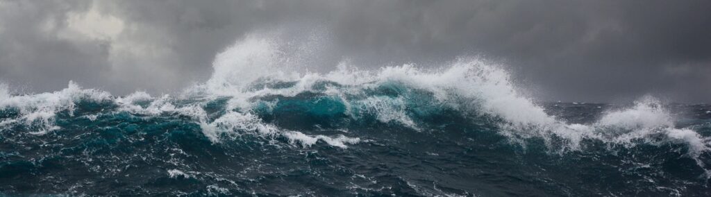 A wave crashing in a storm
