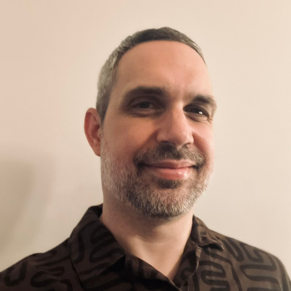 A headshot of Luke M. Jones